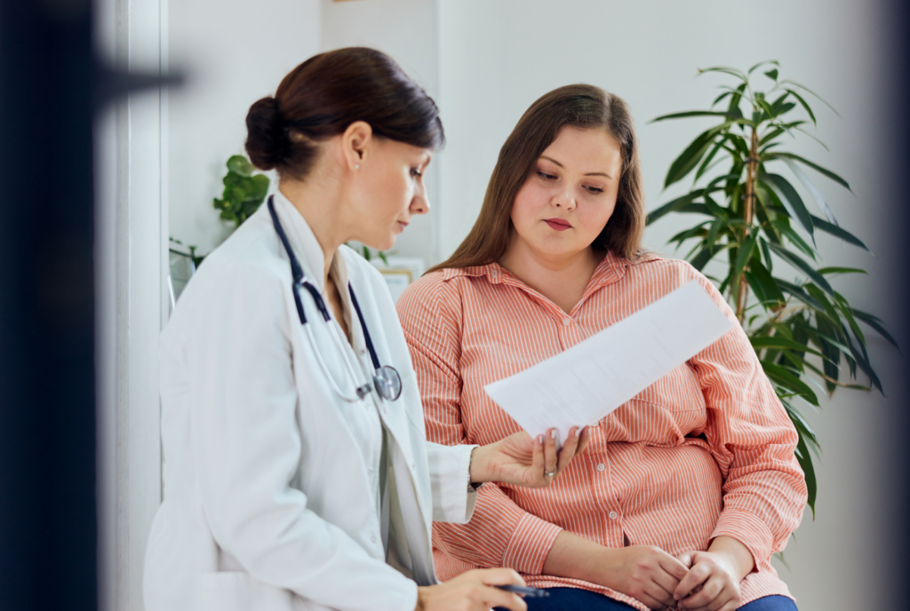 Woman meeting with a medical provider reviewing results