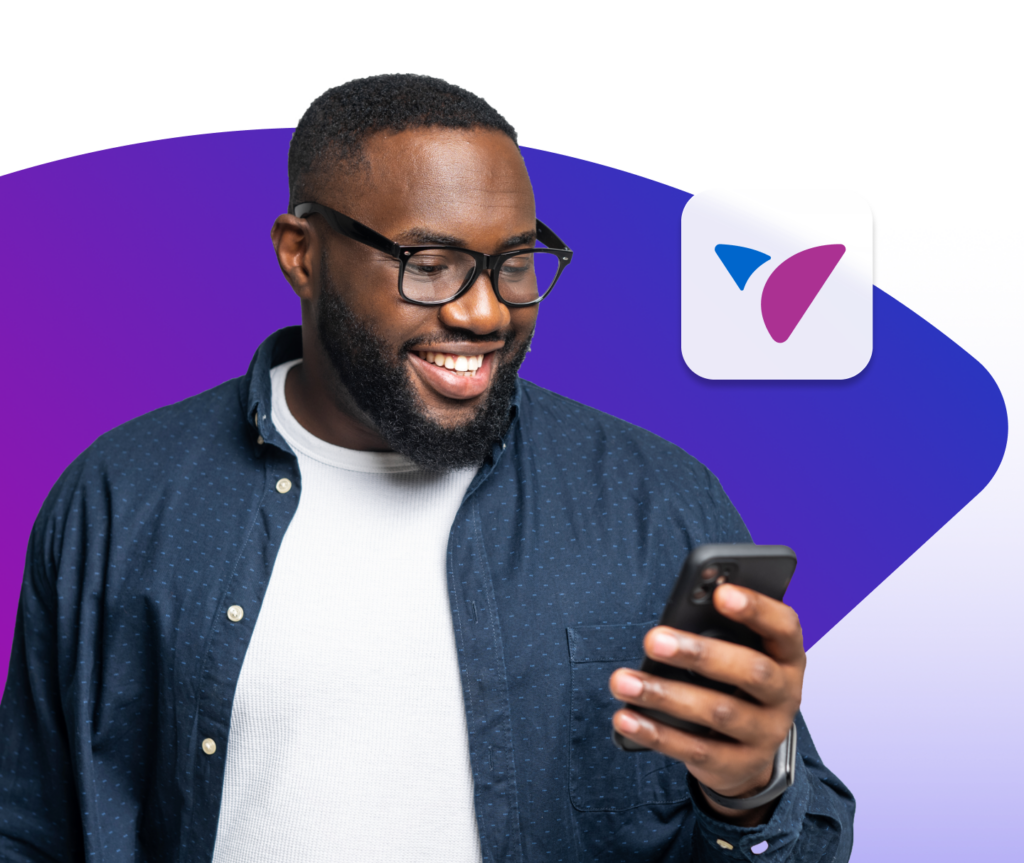 Male looking at his phone, using the Vida app